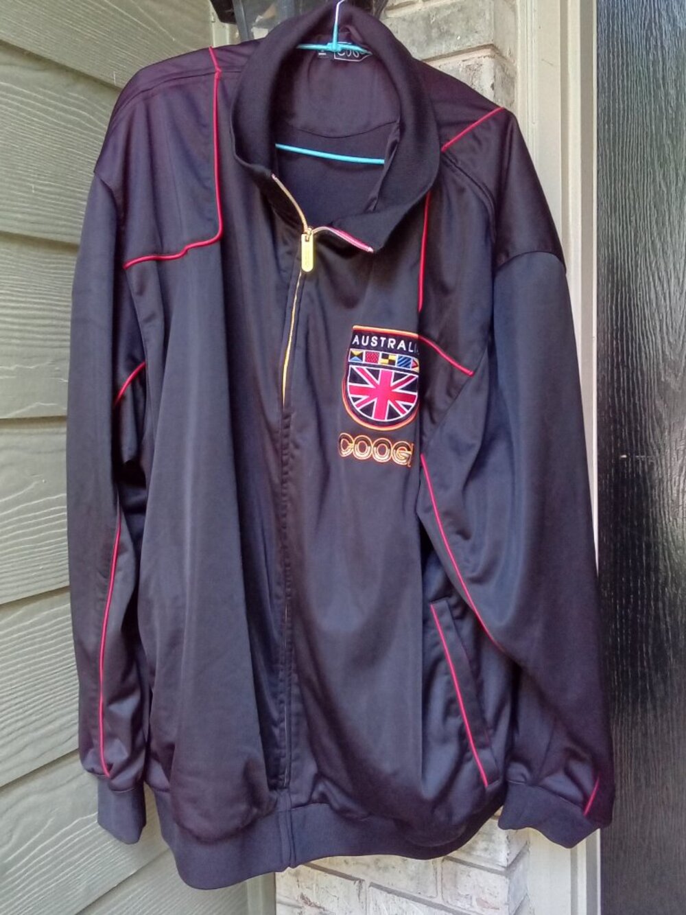 The Men's Coogi Australia Track Jacket is a stylish and comfortable full zip